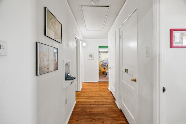 corridor featuring hardwood / wood-style floors