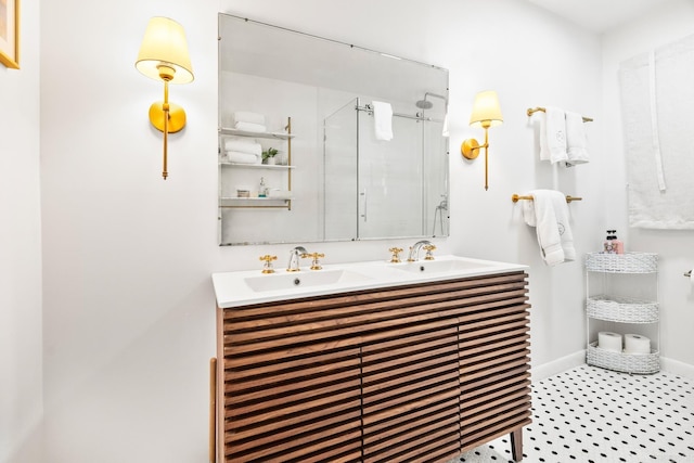 bathroom featuring tile patterned flooring, vanity, and an enclosed shower