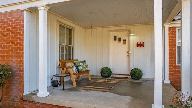 entrance to property with a porch