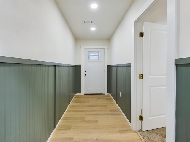 doorway to outside featuring light hardwood / wood-style flooring