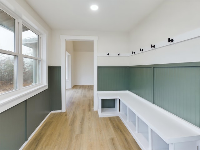 mudroom with light hardwood / wood-style floors