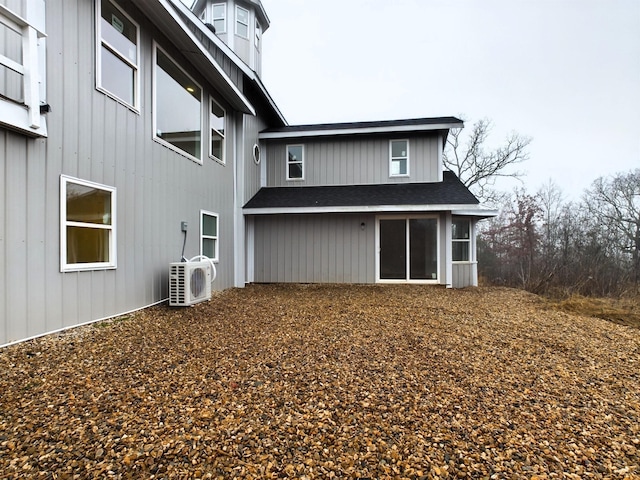 back of property featuring ac unit