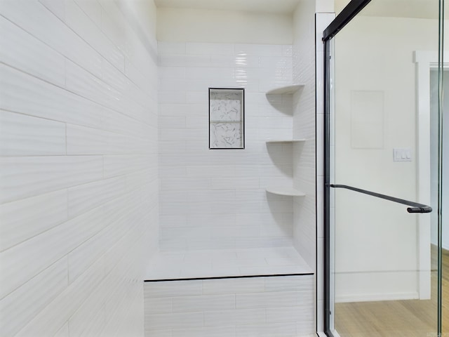 bathroom with an enclosed shower