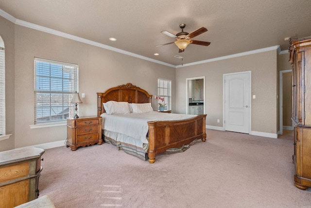 carpeted bedroom featuring ornamental molding and ceiling fan