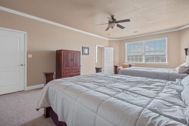 bedroom with light carpet, ceiling fan, crown molding, and a textured ceiling