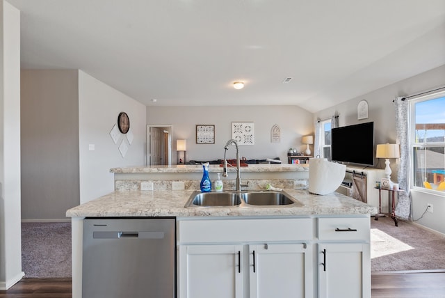 kitchen featuring white cabinetry, sink, dark hardwood / wood-style flooring, and stainless steel dishwasher