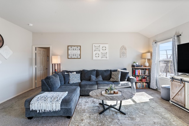 carpeted living room featuring lofted ceiling