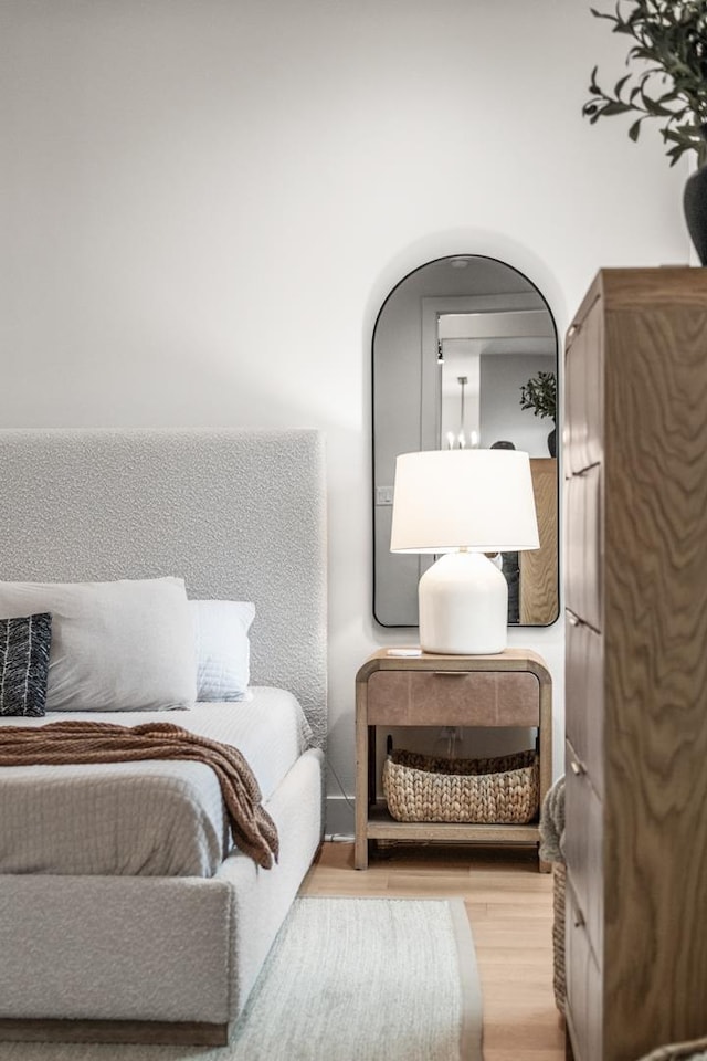 bedroom featuring light wood-type flooring