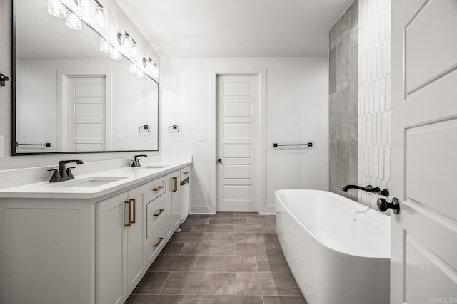 bathroom featuring vanity and a bathtub