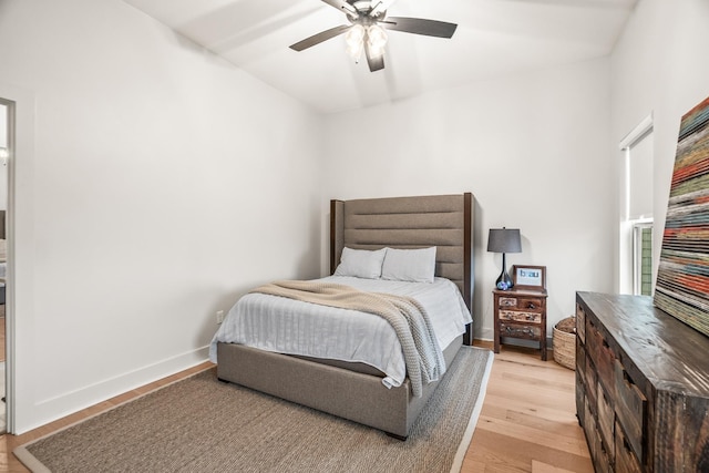 bedroom featuring ceiling fan and light hardwood / wood-style flooring