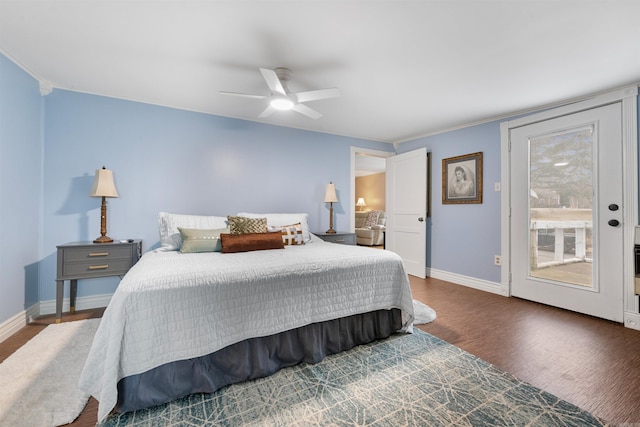 bedroom with dark hardwood / wood-style floors and ceiling fan