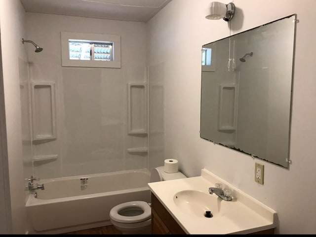 full bathroom featuring shower / tub combination, vanity, and toilet