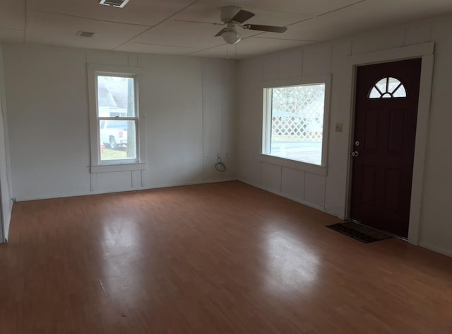 foyer entrance with ceiling fan and hardwood / wood-style floors