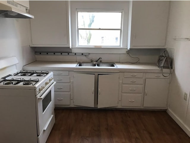 kitchen with sink, dark wood-type flooring, white cabinets, and white range with gas stovetop