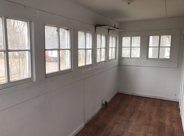 unfurnished sunroom with a healthy amount of sunlight