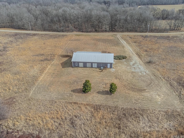 birds eye view of property with a rural view