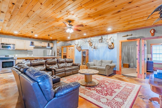 living room with ceiling fan and wood ceiling