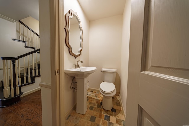 bathroom featuring toilet