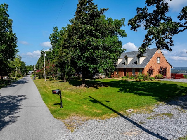 exterior space with a front yard