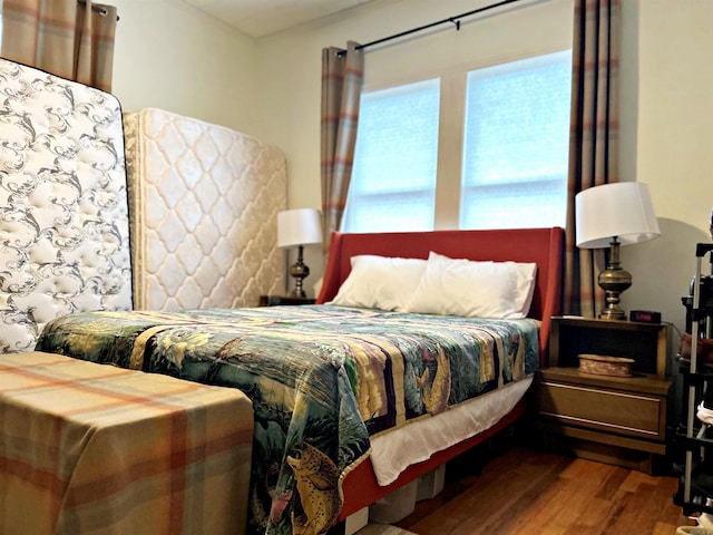 bedroom featuring wood-type flooring