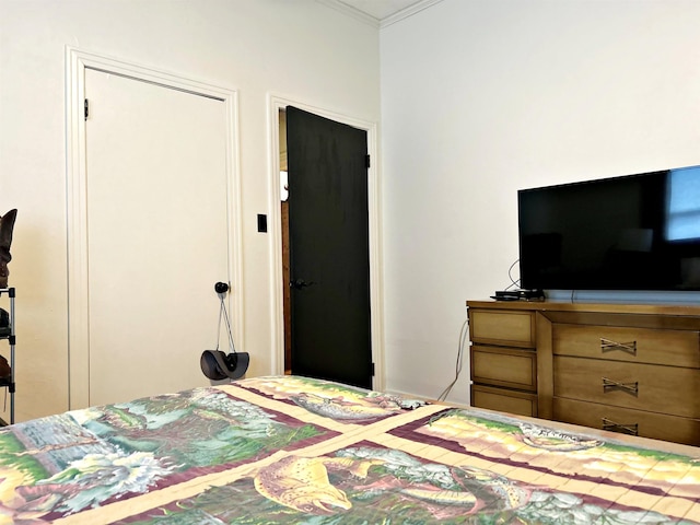 bedroom featuring ornamental molding