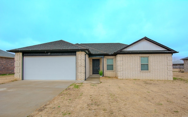 ranch-style house featuring a garage