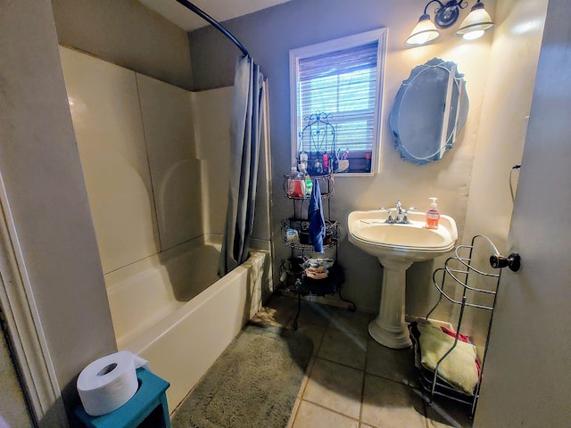bathroom with sink, tile patterned flooring, and shower / bath combo