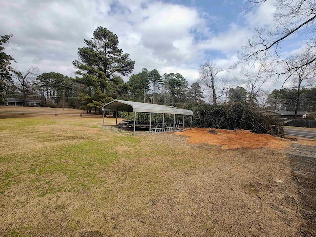 view of yard featuring a carport