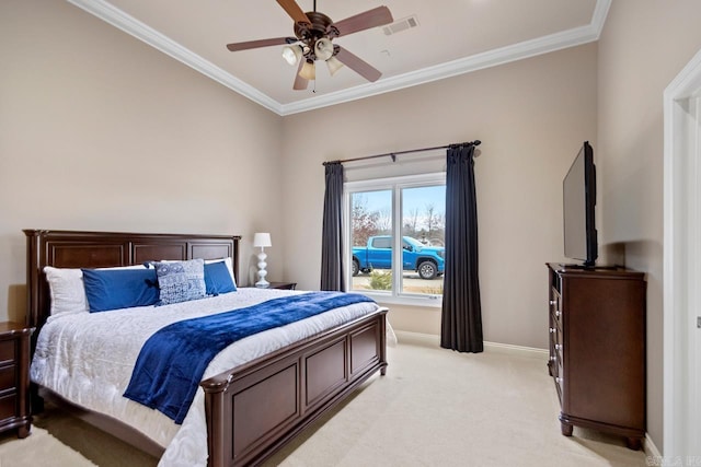 carpeted bedroom featuring crown molding and ceiling fan