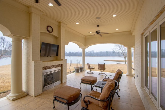 view of patio featuring ceiling fan