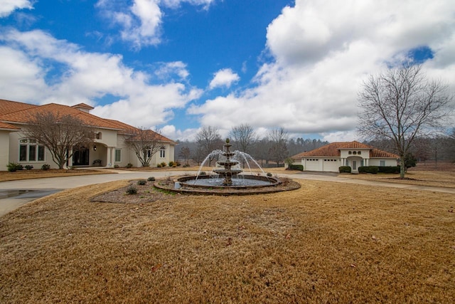 view of yard featuring a garage