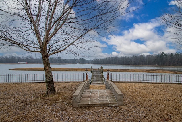 dock area featuring a water view