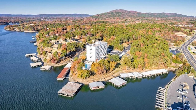 aerial view featuring a water and mountain view