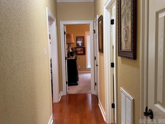 hall with dark wood-type flooring