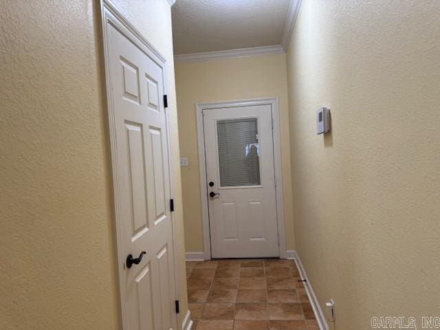 corridor featuring crown molding and tile patterned flooring