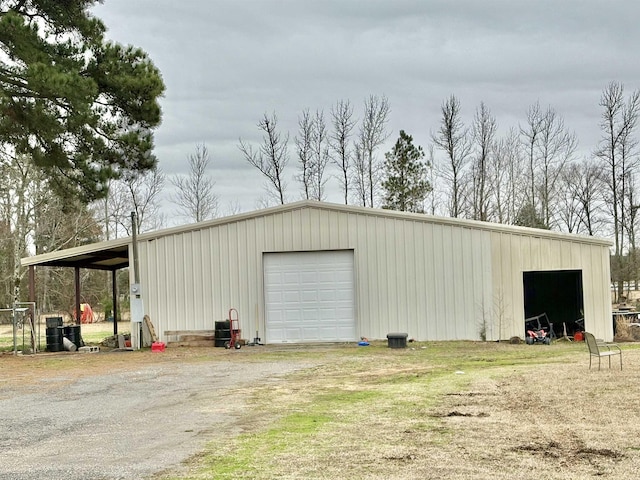 view of outbuilding featuring a garage