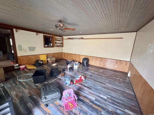 living room featuring dark hardwood / wood-style flooring, ceiling fan, wood ceiling, and wood walls