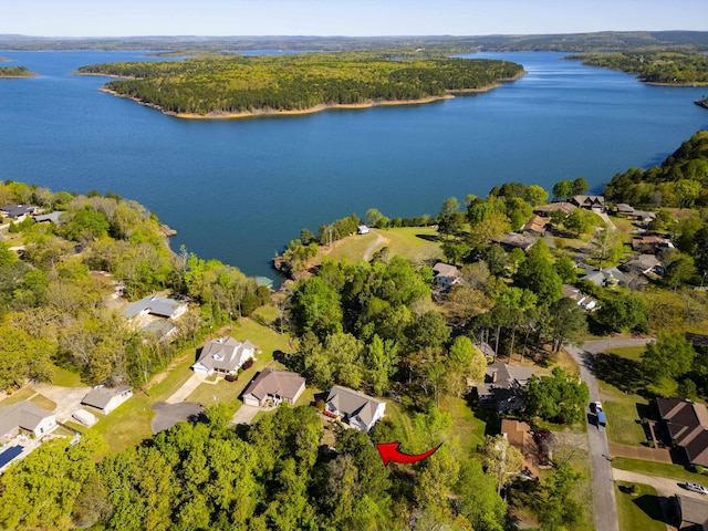 drone / aerial view with a water view