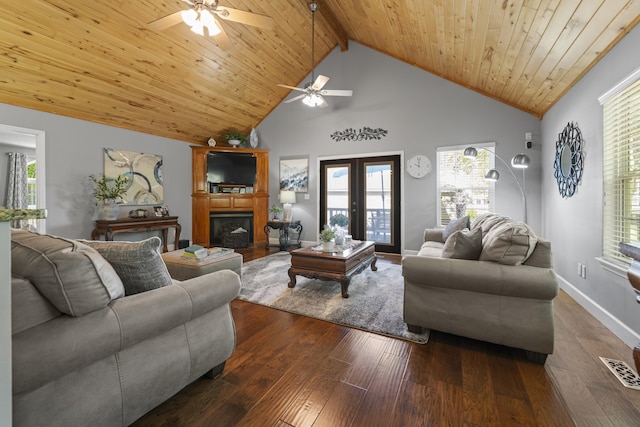 living room featuring high vaulted ceiling, beamed ceiling, dark wood-type flooring, wooden ceiling, and french doors