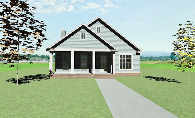 rear view of house featuring a lawn, a sunroom, and a chimney