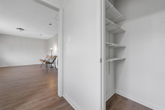 interior space with dark wood-type flooring