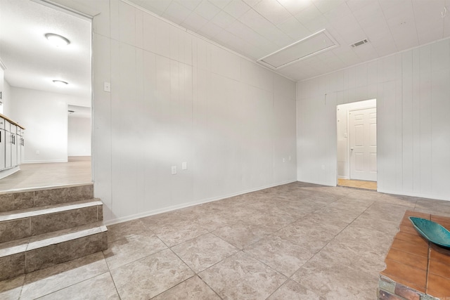 empty room featuring light tile patterned floors