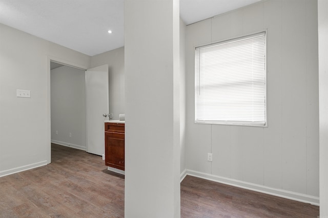 empty room featuring wood-type flooring