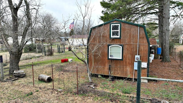 view of property exterior featuring a shed