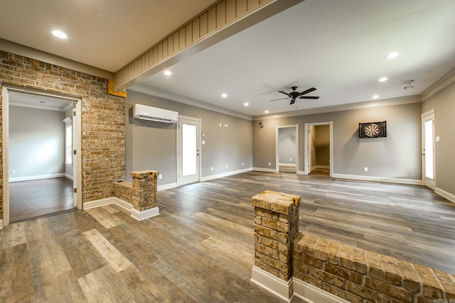 unfurnished living room with crown molding, ceiling fan, dark hardwood / wood-style flooring, and an AC wall unit