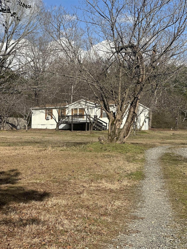 view of yard with a wooden deck