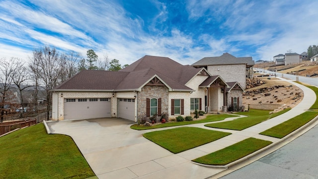 craftsman-style house with a garage and a front lawn