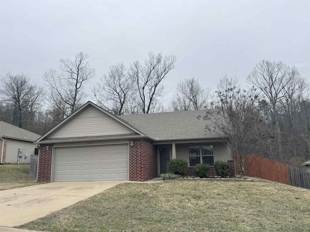 single story home featuring a garage and a front lawn