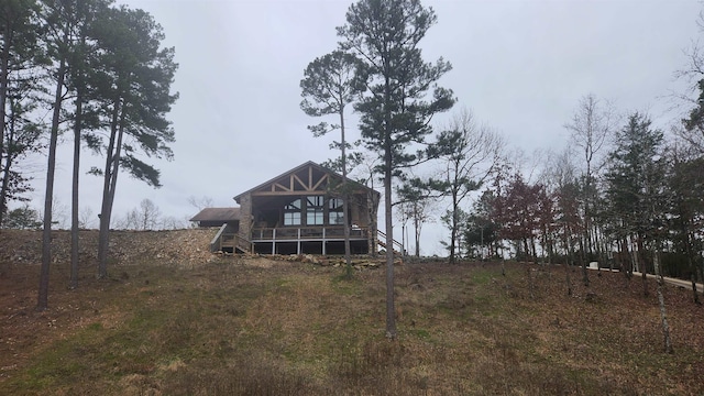 rear view of house with a sunroom