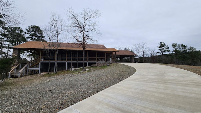 exterior space featuring a sunroom